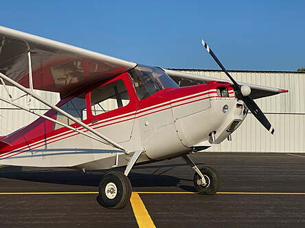 Vx Pilot Academy's beautiful red and white bellanca 7EC champ